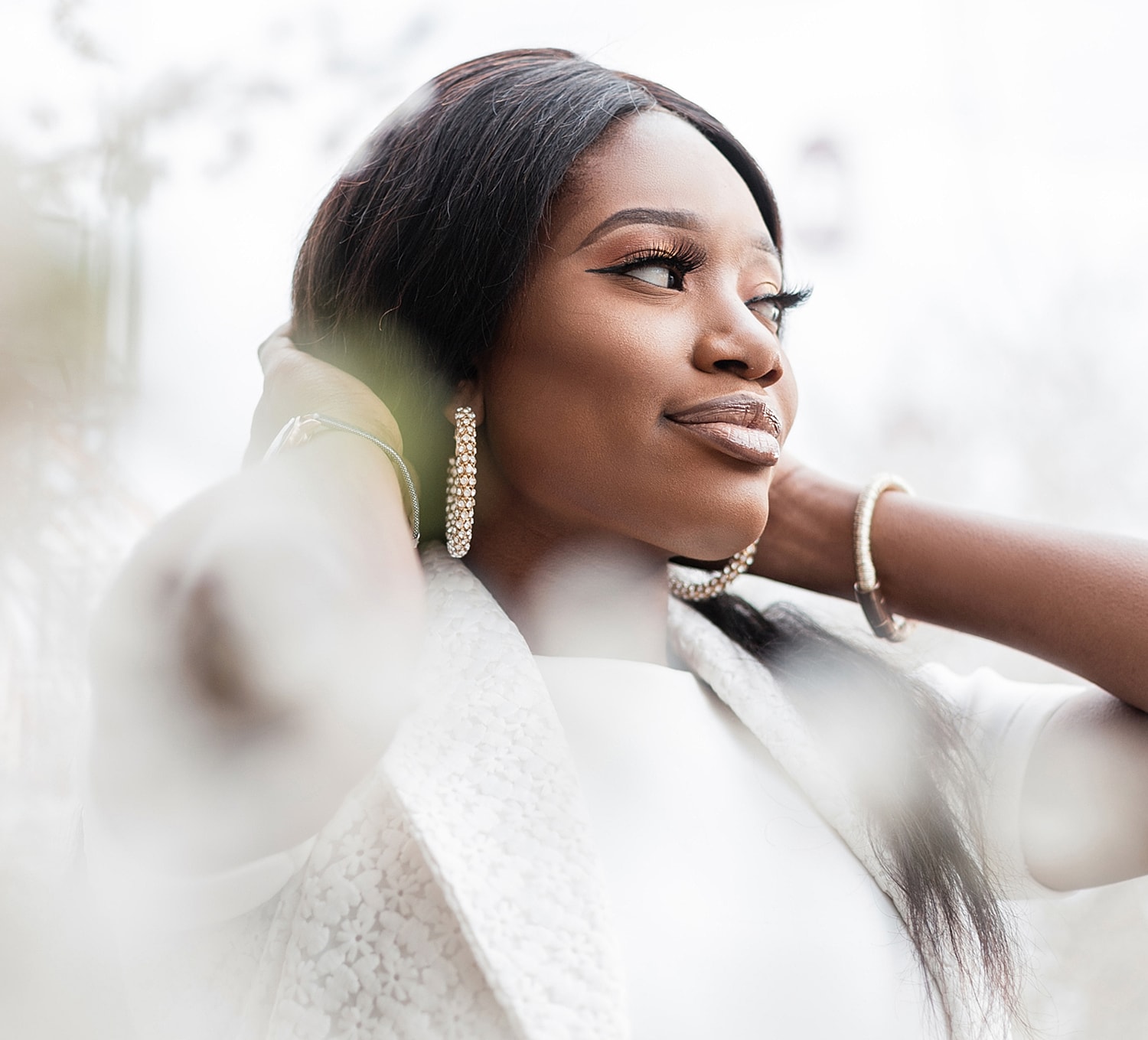 Close-up of a woman's face with soft makeup.