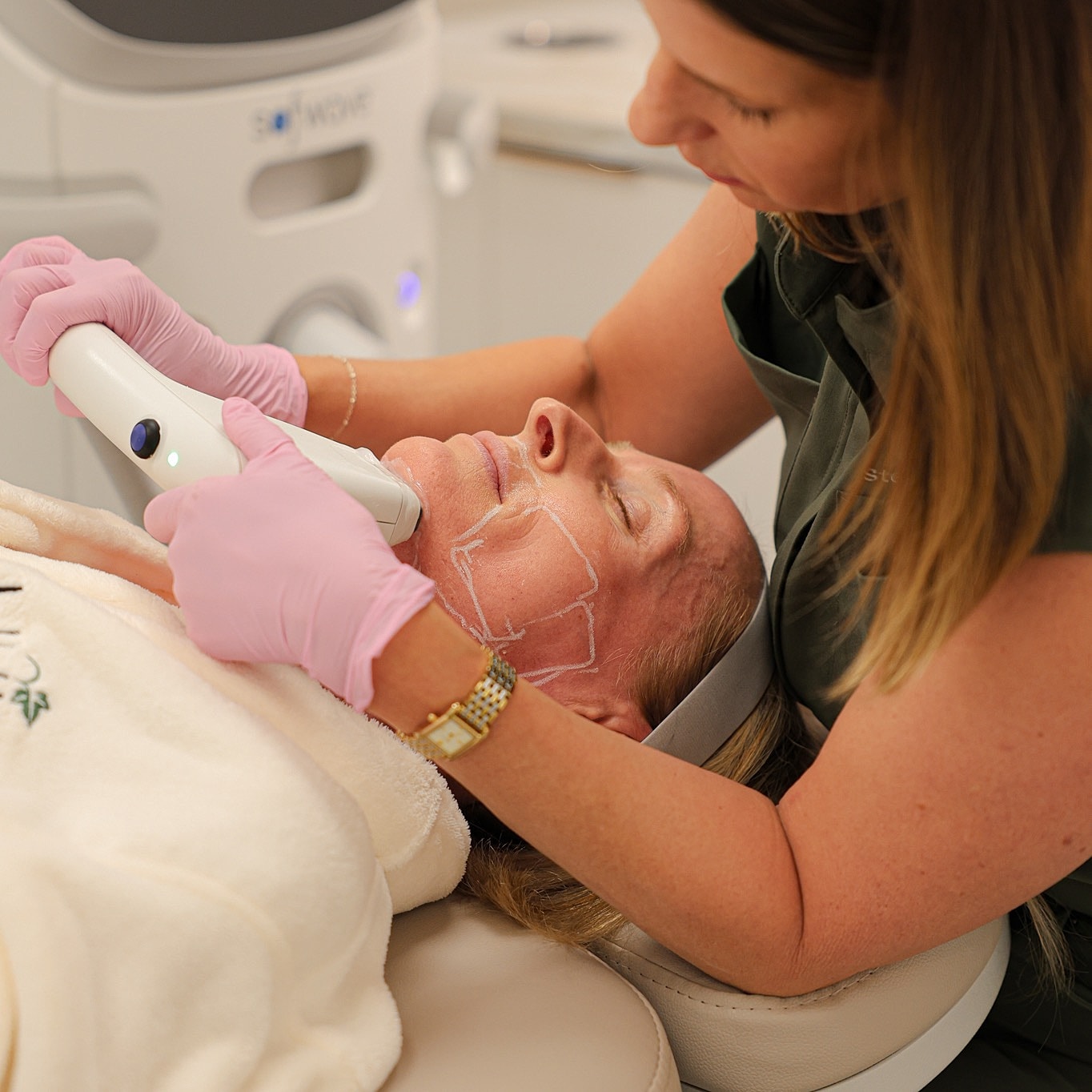 Facial treatment session in a cosmetic clinic.